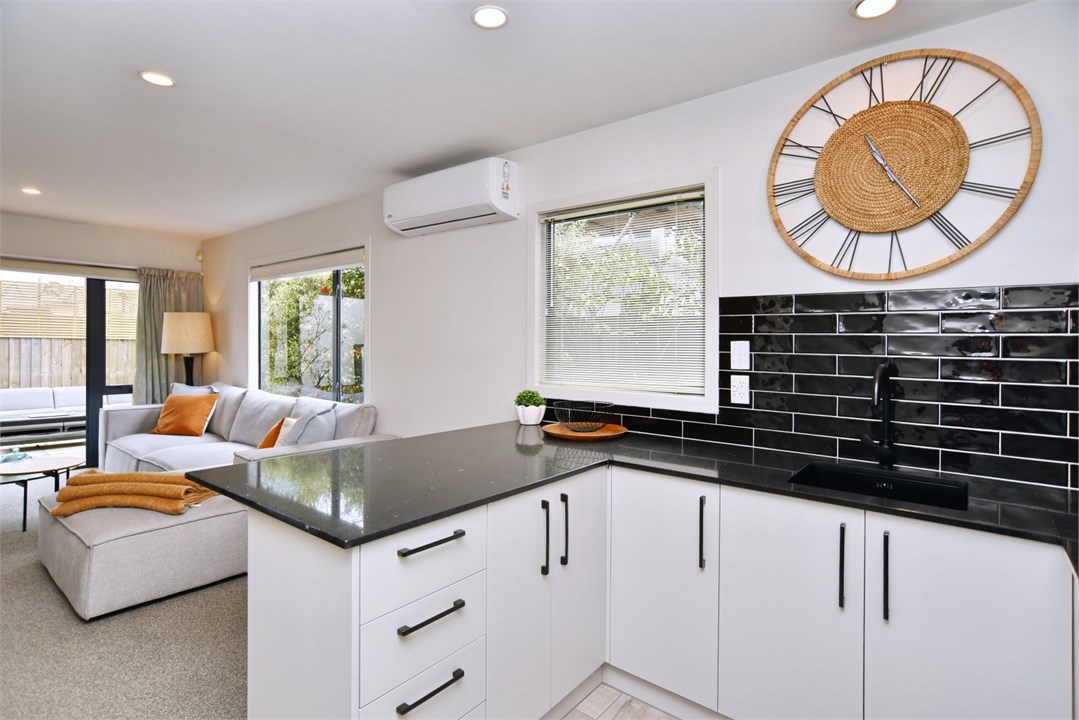 Fully equipped Kitchen area with seating at the be