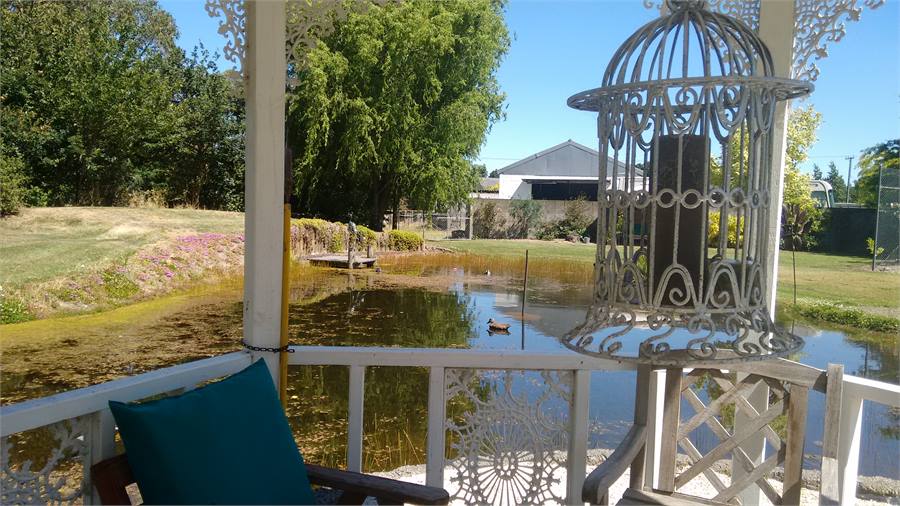 Candle birdcage nighti time stroll to summerhouse.