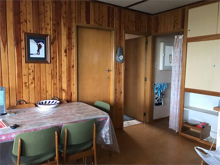 Dining room looking towards the bunk room and bath