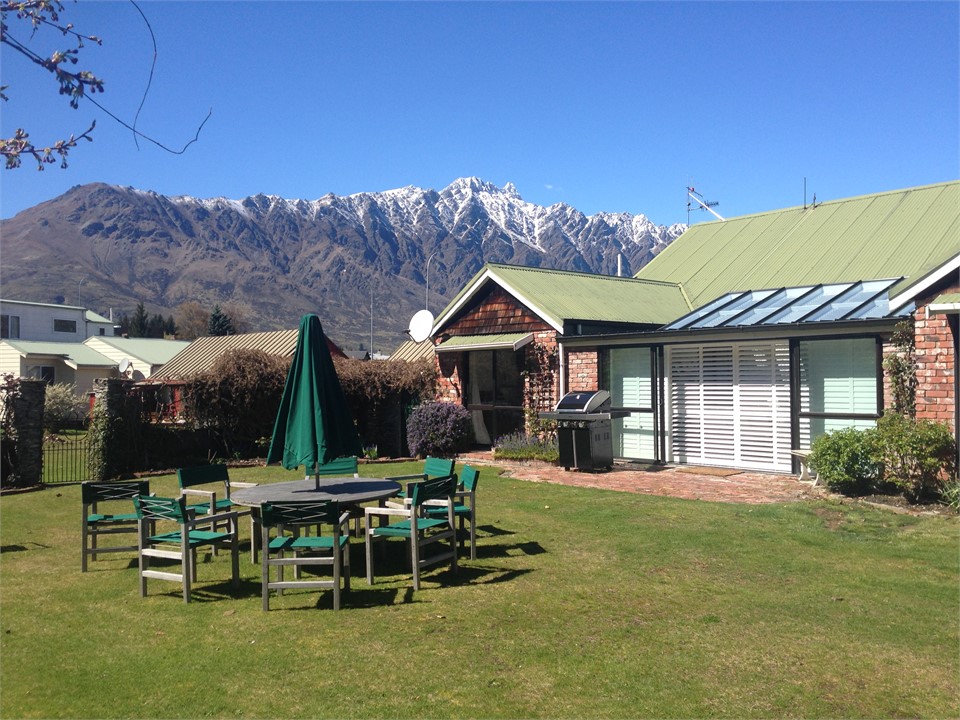 A private lawn with views of the Remarkables