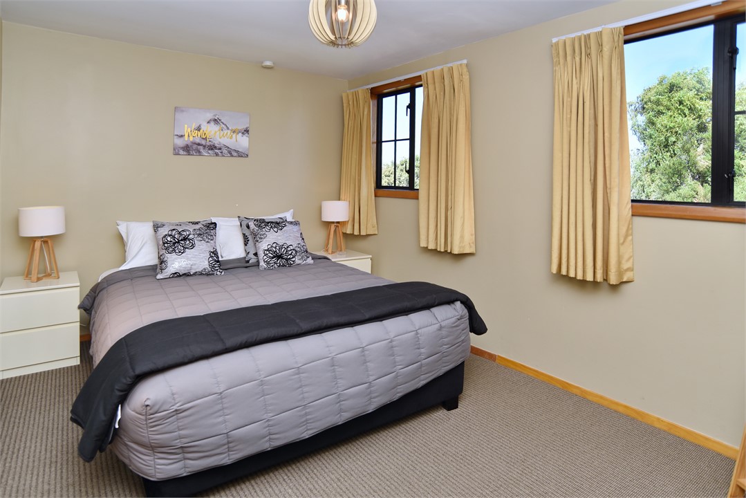 Bedroom 3 has a Queen bed