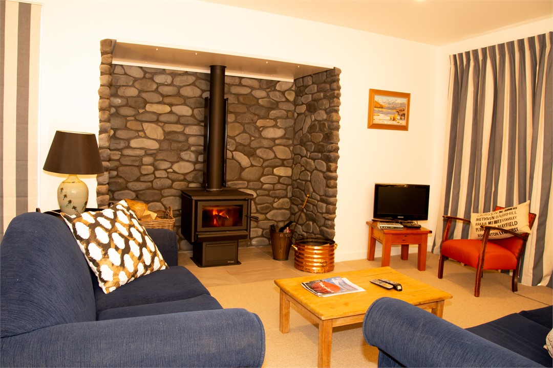 sitting room with log fire