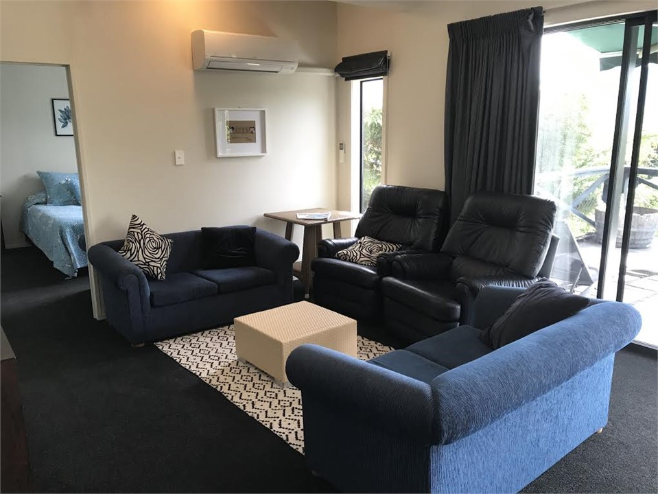 Lounge area - two fully reclining leather lazy boy