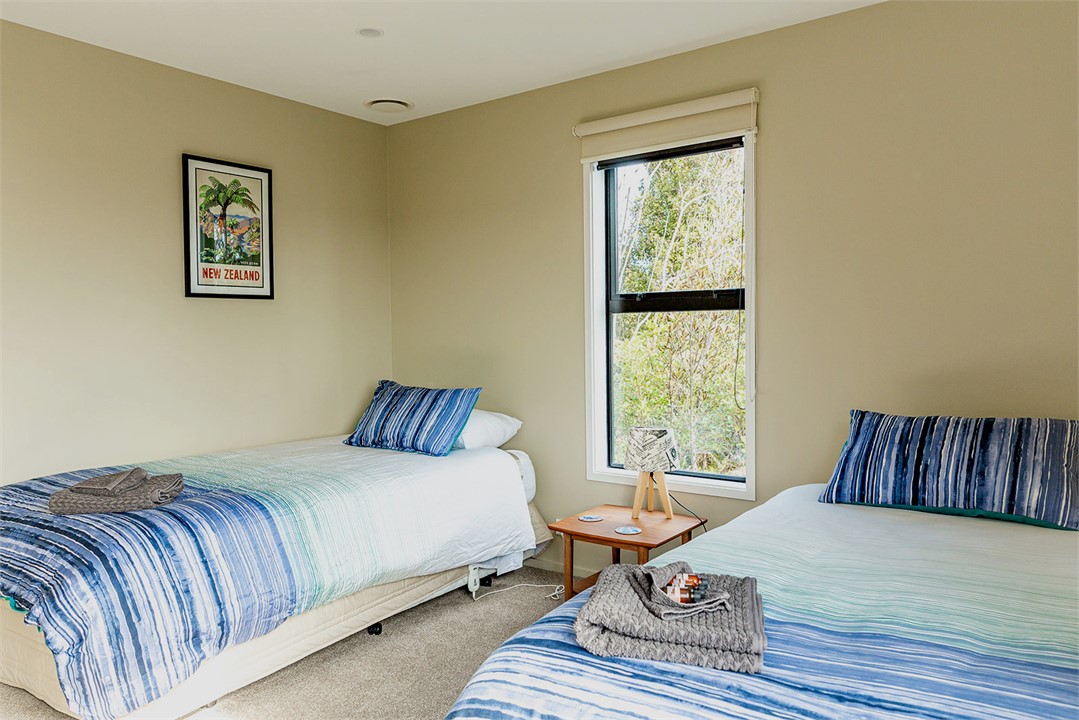 Bedroom three - two king single beds