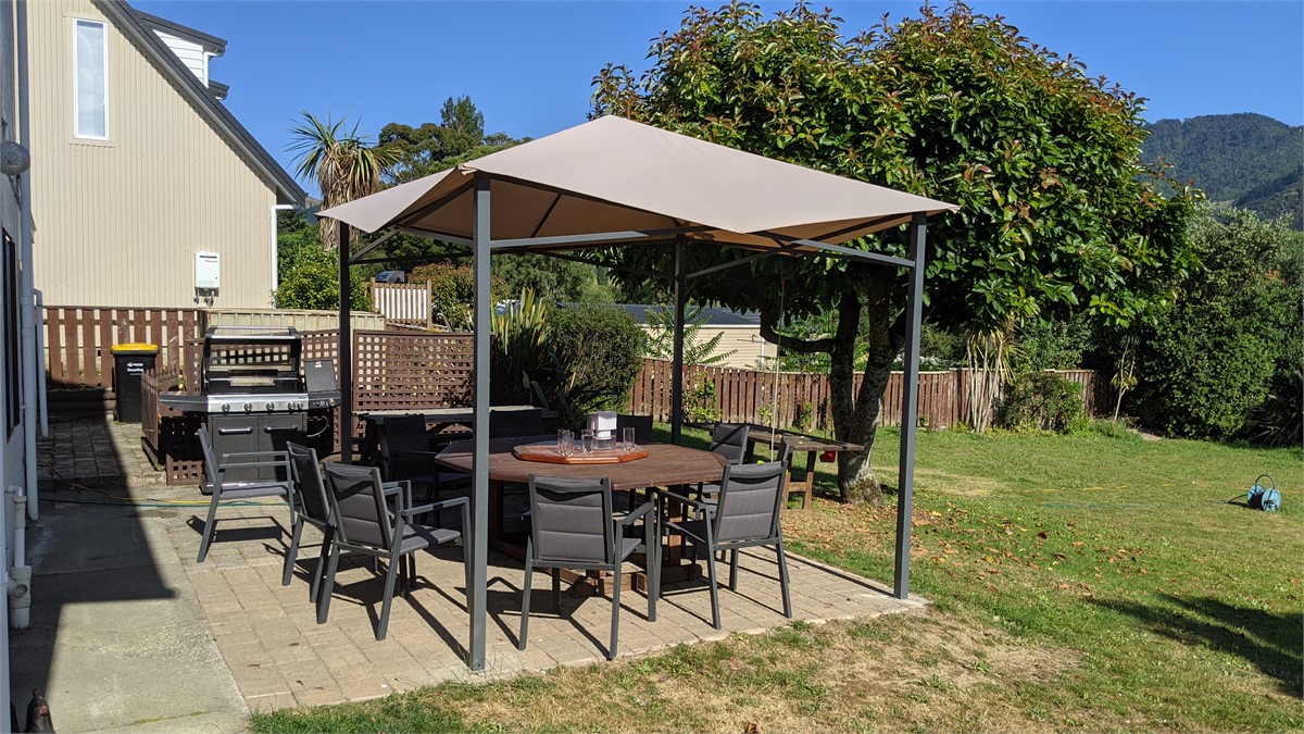 Rear outside eating area seats 10, and BBQ