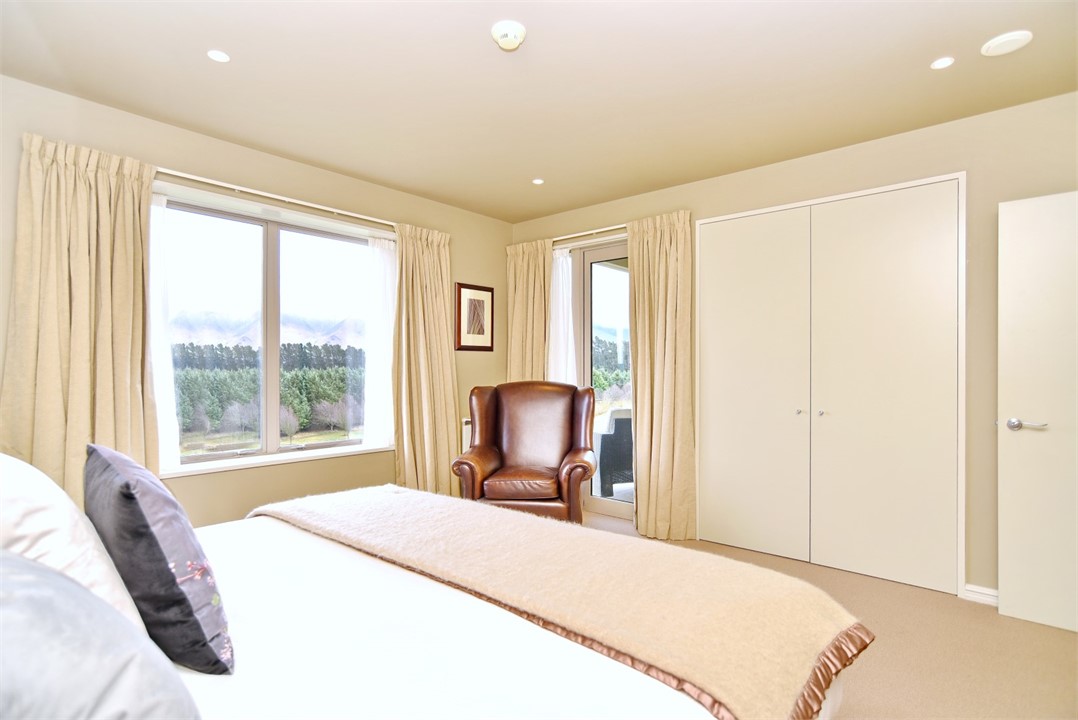 Bedroom 1 has a California King bed with a sitting