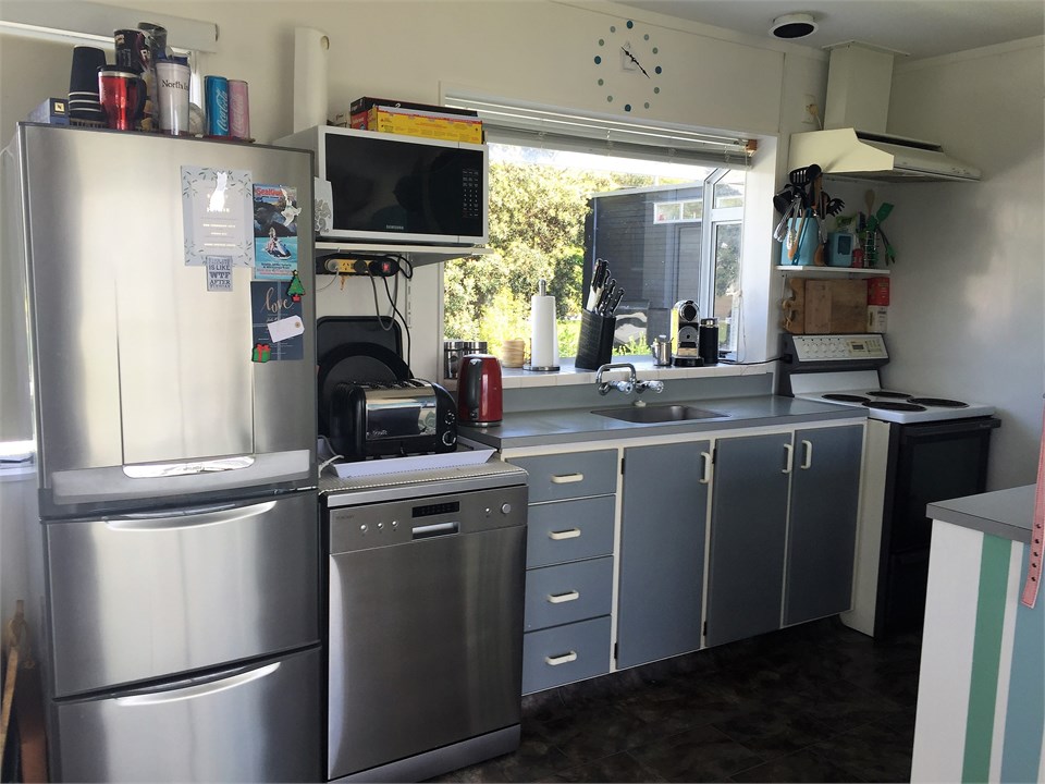 Basic small galley-kitchen upstairs