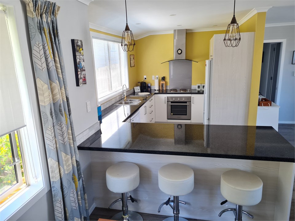 Kitchen and breakfast bar