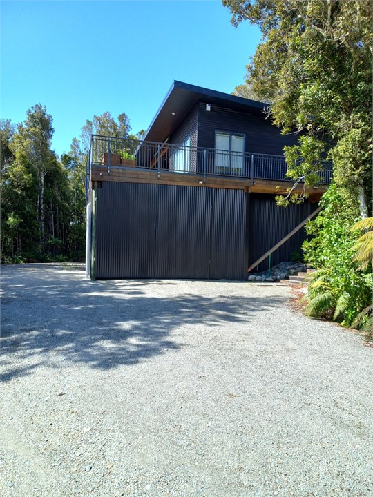 As you enter drivway