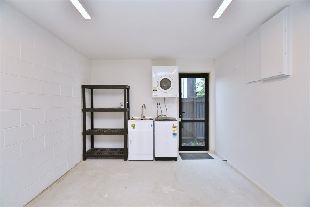 Laundry area has a Washing machine and Dryer