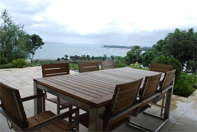 Outdoor dining with extensive harbor views