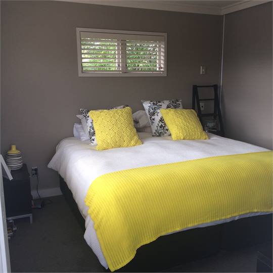 Master bedroom opens onto separate upstairs deck