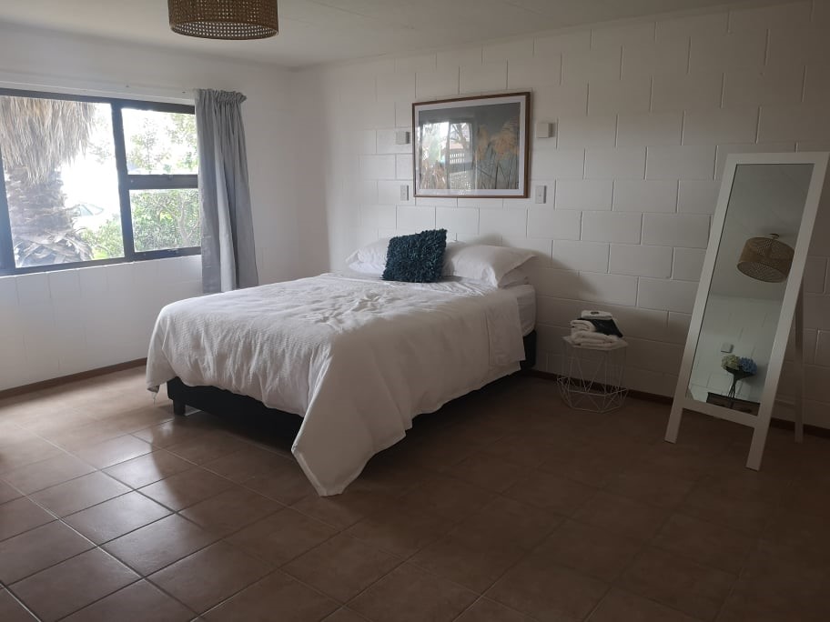 Spacious bedroom with queen bed