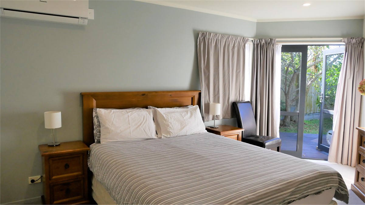 Master bedroom (queen bed) with access to deck