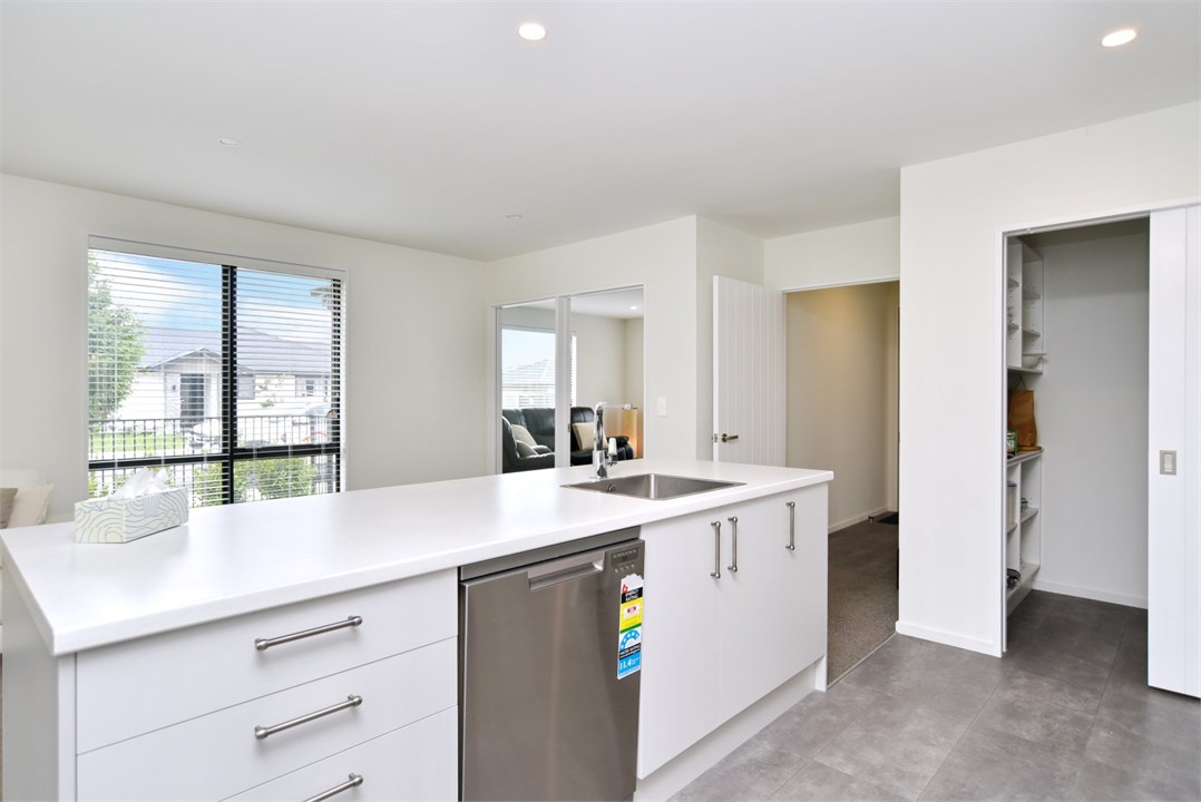 Fully equipped Kitchen area with seating at the be