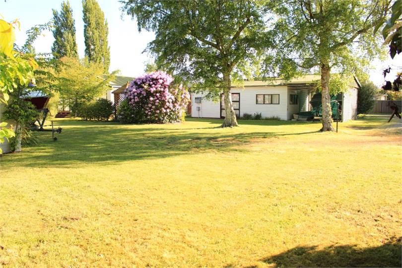 Safe boat parking on large rear lawn