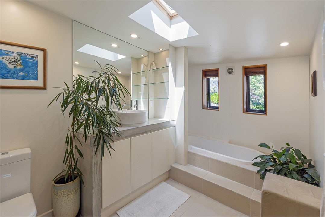 Main bathroom with Shower over Bath, Toilet & Vani