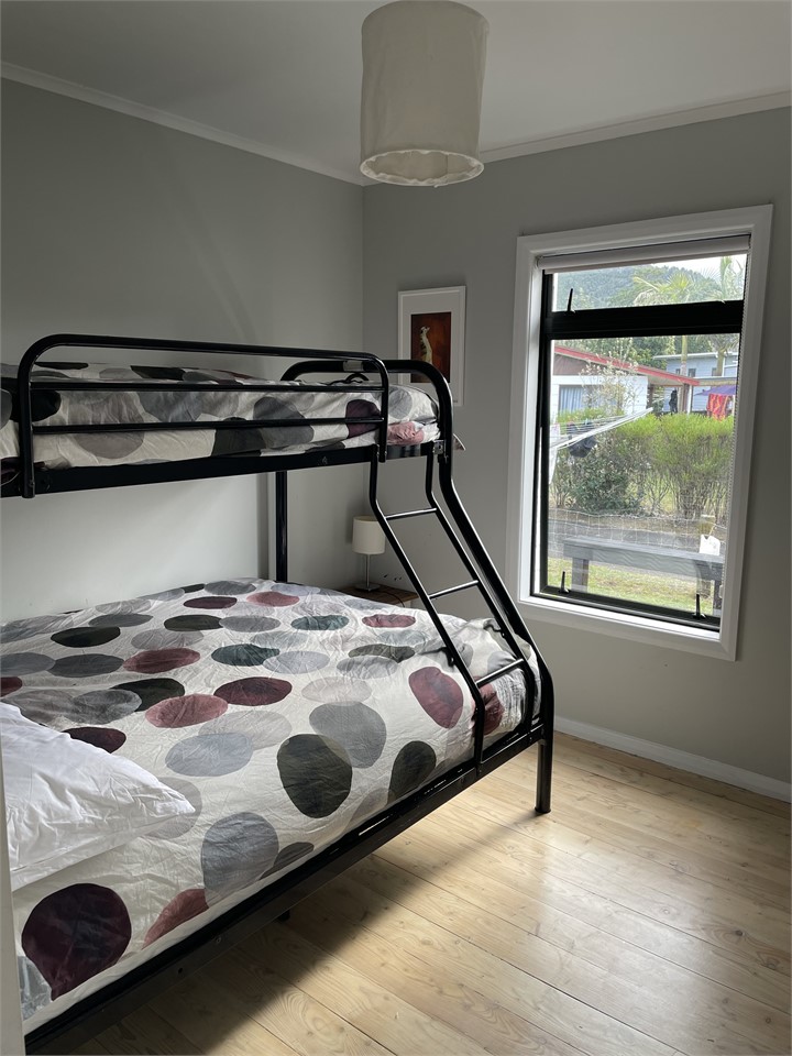 double and single bunks in second bedroom