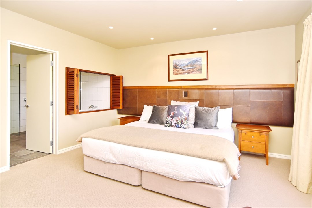 Bedroom 1 has a California King bed with a sitting