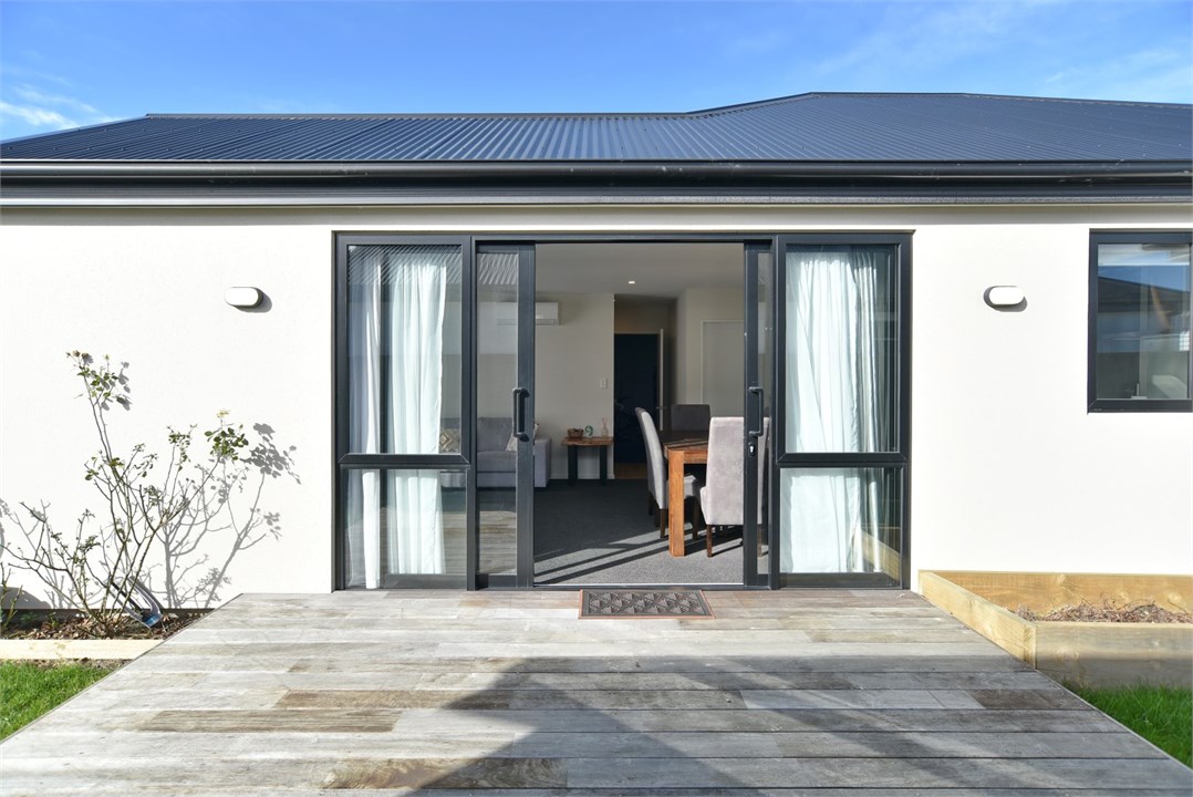 View of the property building and the deck