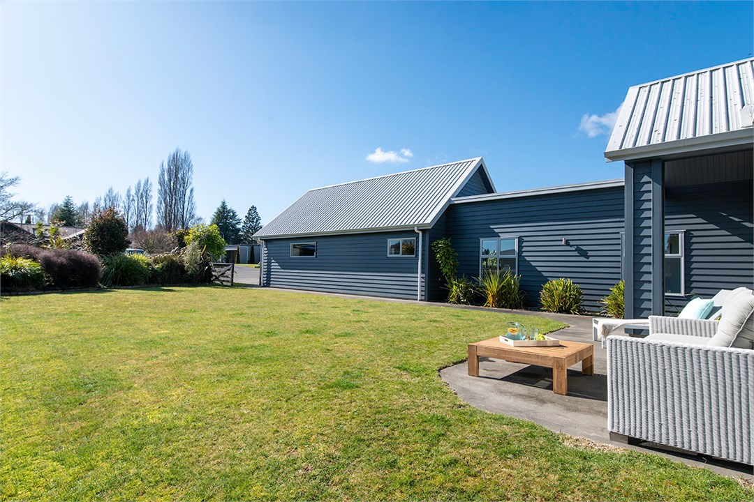 Sunny outdoor patio & front yard
