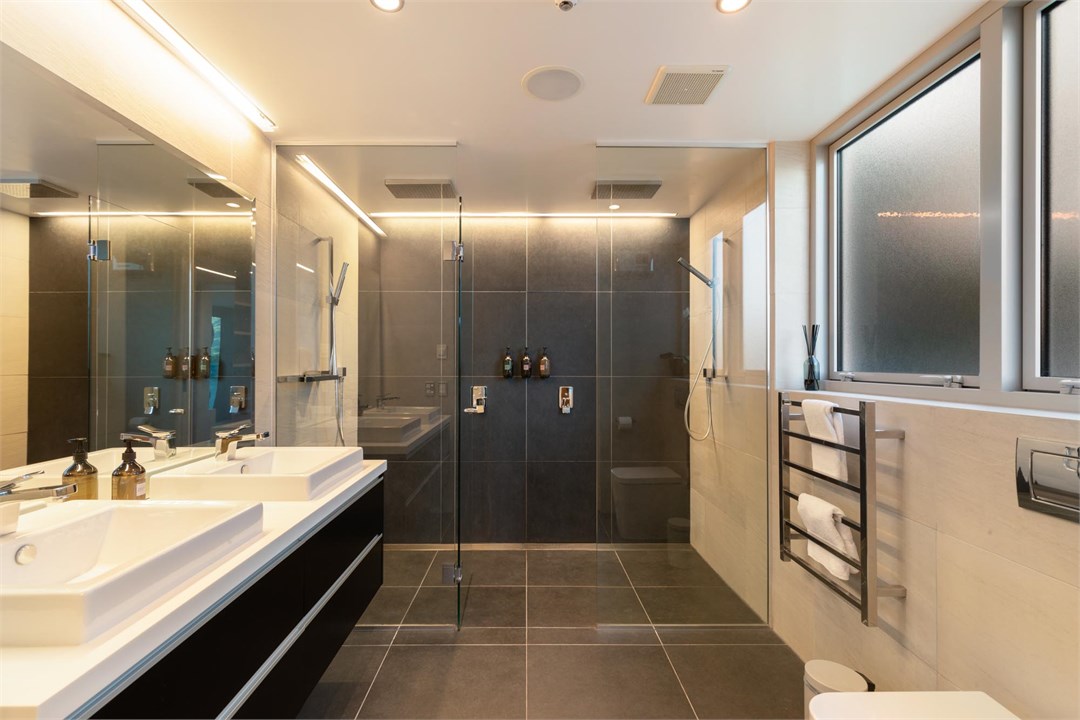 Master ensuite with double vanities + rain shower