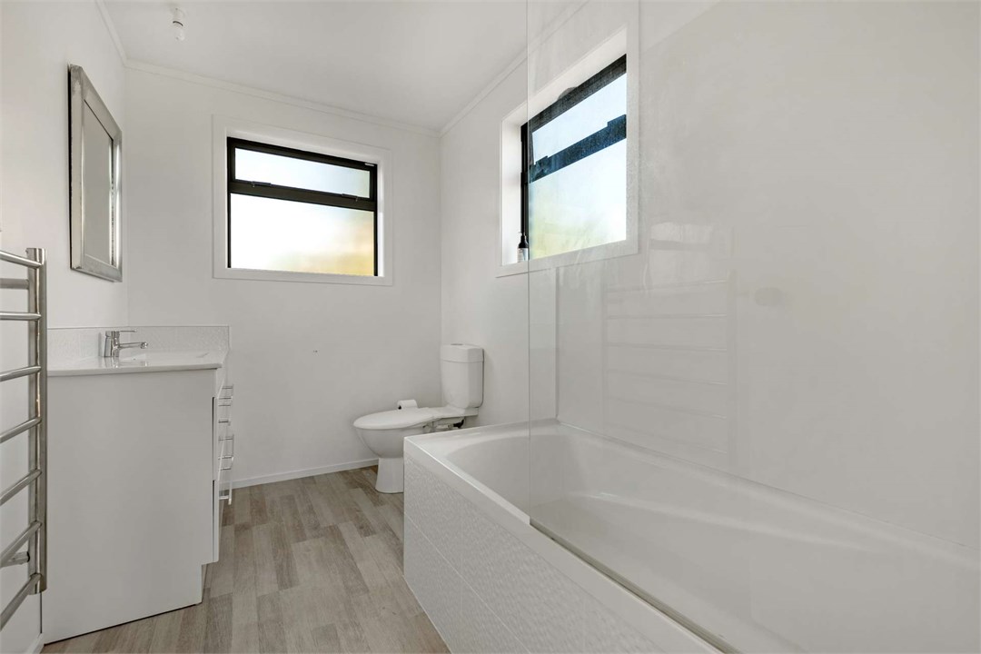 Upstairs bathroom with bath