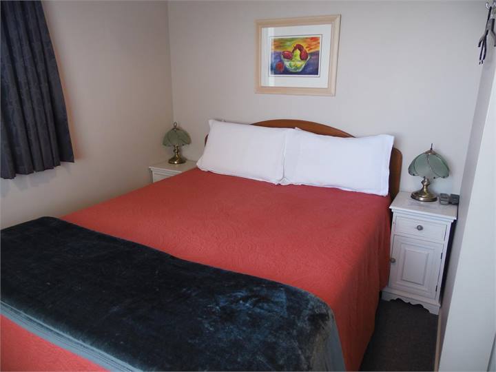 Bedroom 1 - Queen bed - plus TV and wardrobe with 