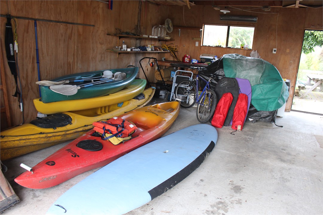 kayaks, paddle board, bikes, boogie boards