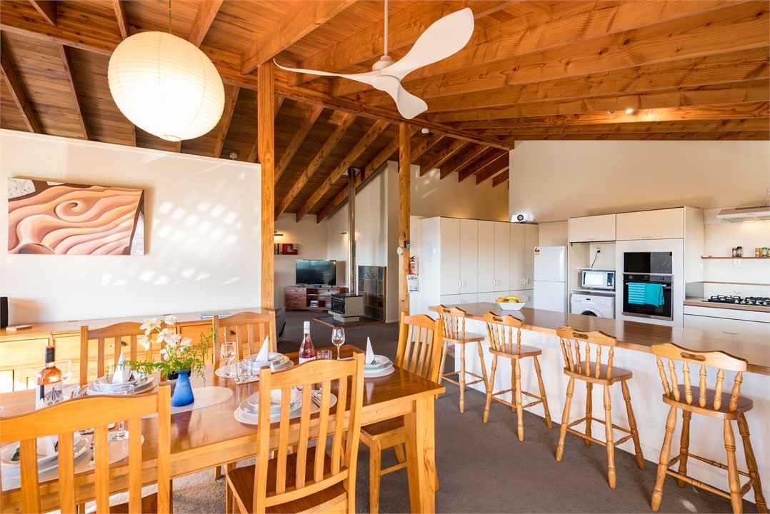 Dining & kitchen through to lounge