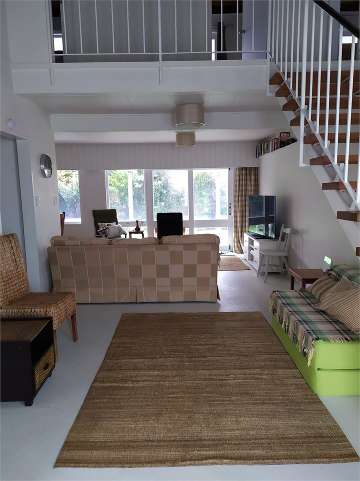 Downstairs living kitchen bathroom opens to enclos