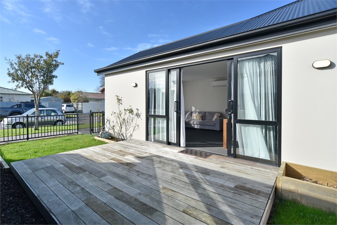 View of the property building and the deck