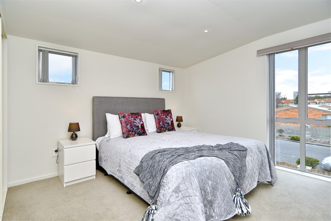 Bedroom 3 has a Queen bed