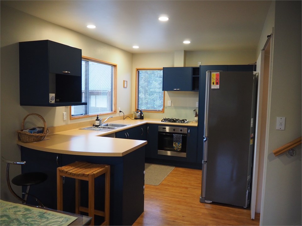 Kitchen including breakfast bar