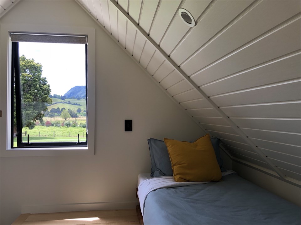 2 Single beds upstairs in mezzanine