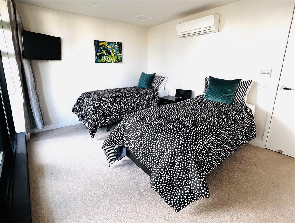 Downstairs bedroom either 2 x singles OR 1 x King