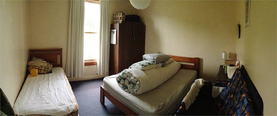 Front room with double bed and spare single