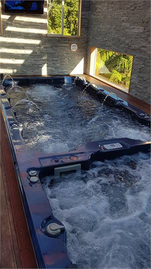 Indoor spa and Lap Pool Entertainment Area