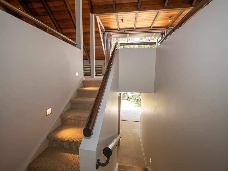 There are 2 flights of stairs to the upper level.