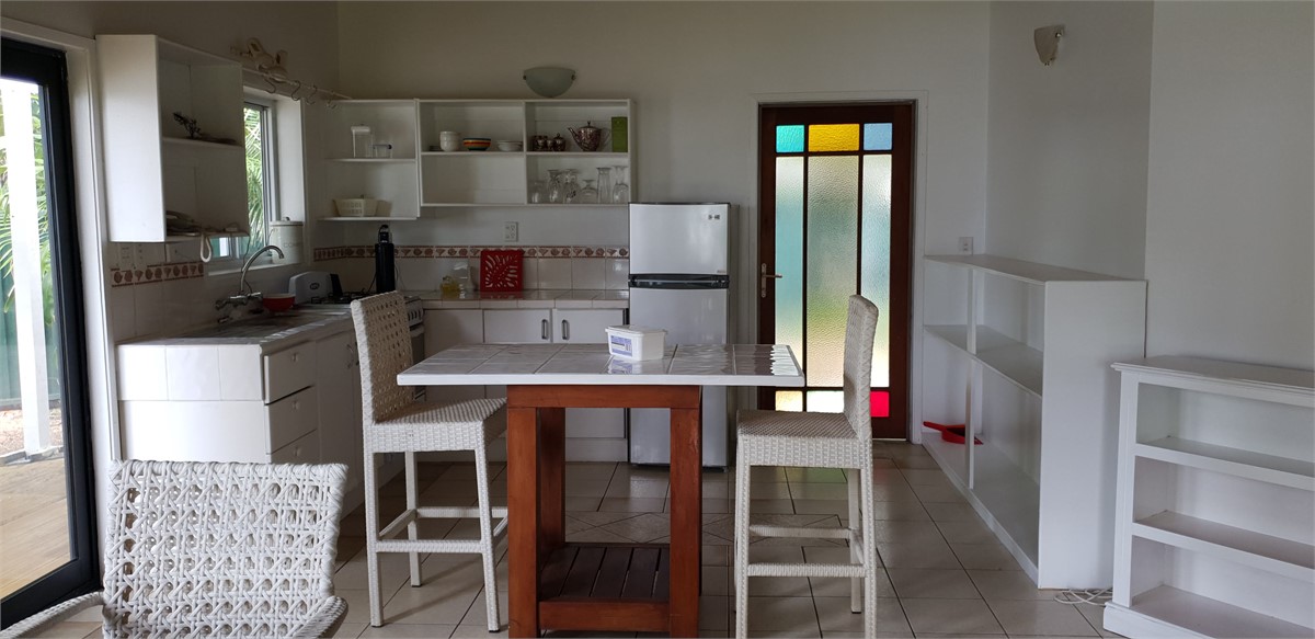 Looking into kitchen from dining area