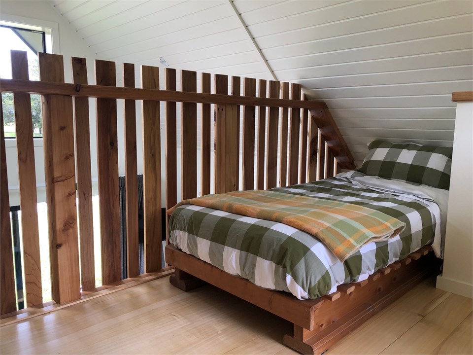 2 Single beds upstairs in mezzanine