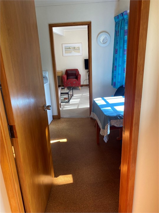 Looking through kitchen into sitting room