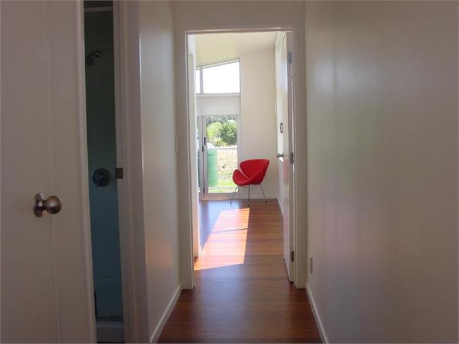 View down hall to main bedroom