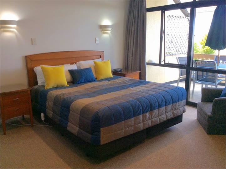 Apartment - Bedroom, with view through door to des