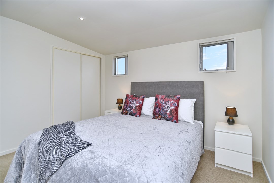 Bedroom 3 has a Queen bed