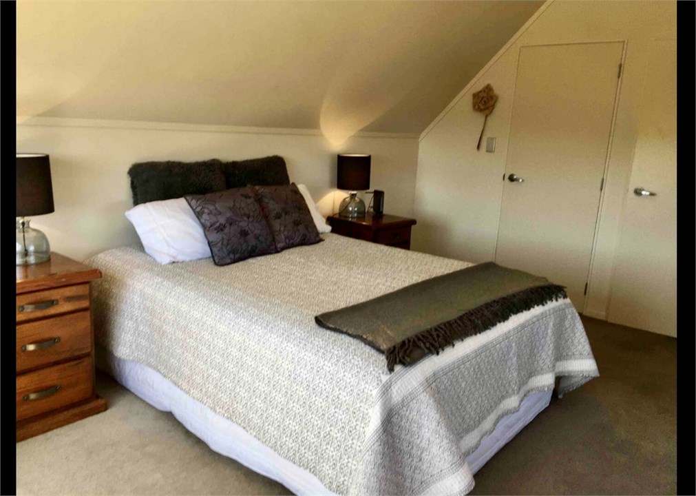 Upstairs queen bedroom different view