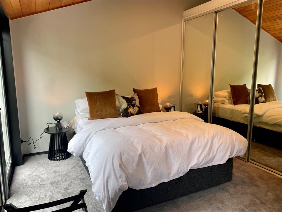 Every room is a treat! Guest bedroom with balcony