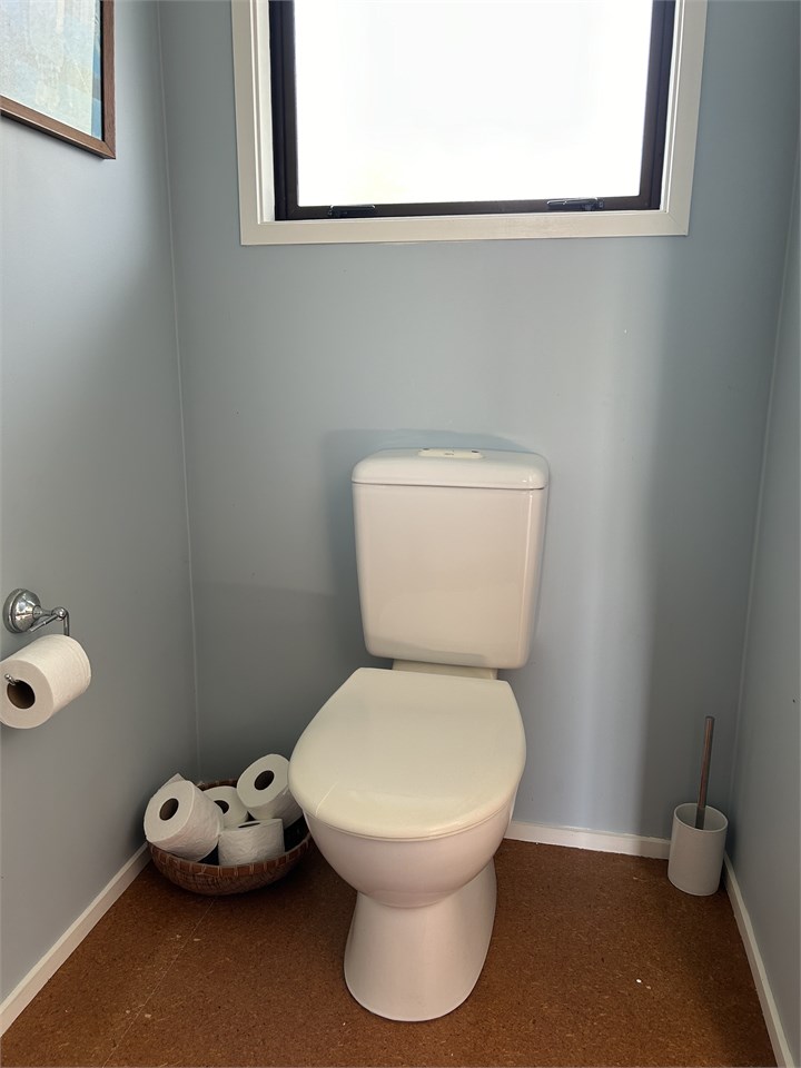 Second toilet and hand basin