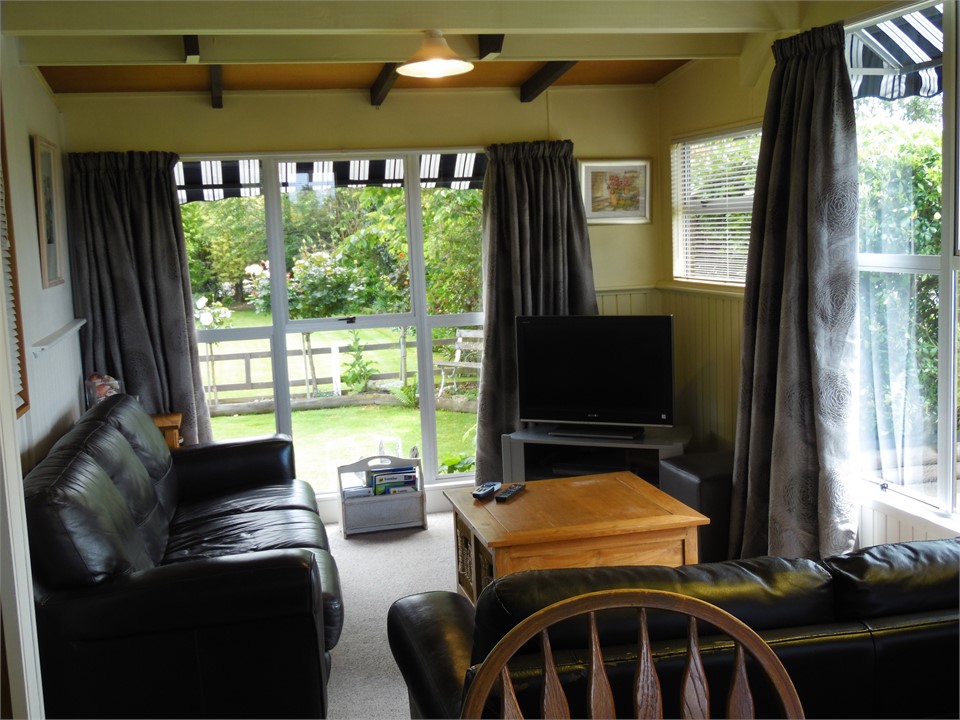 Lounge with a rural and a garden view; Sky TV