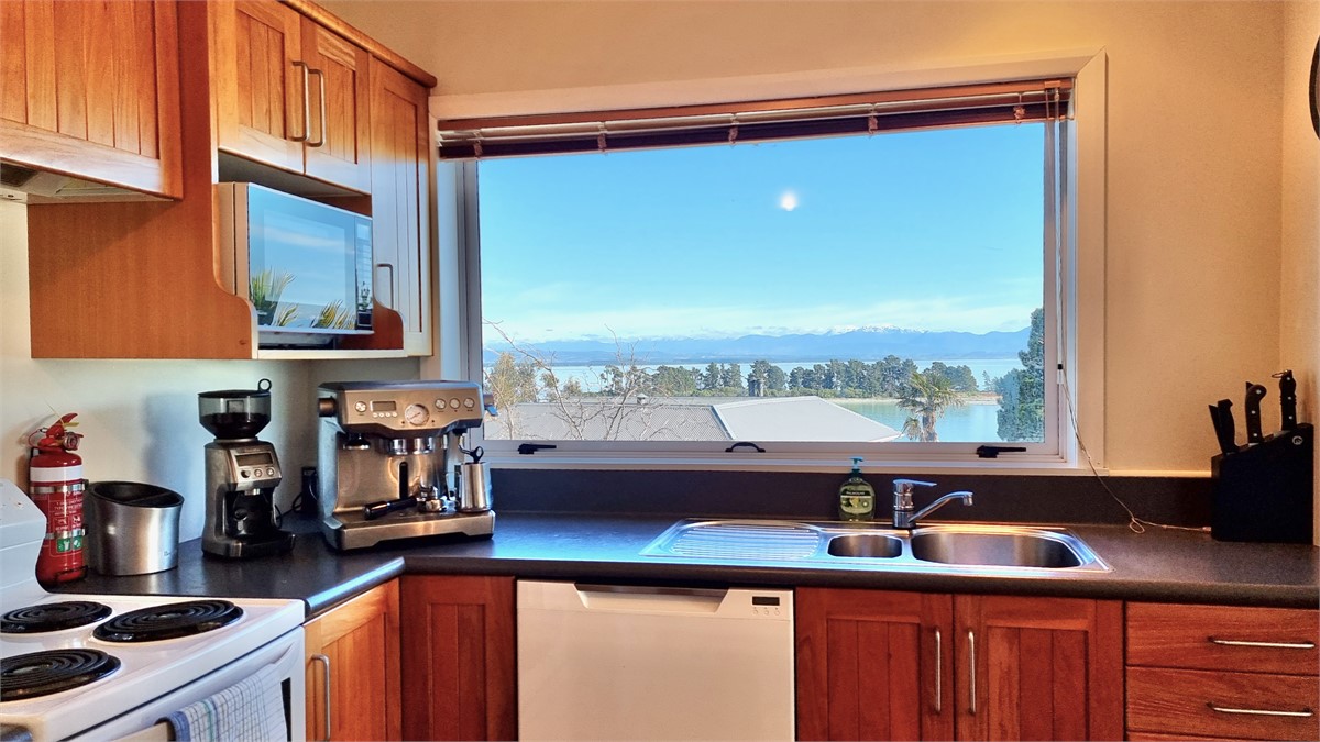 Kitchen views over a local villa to Haulashore Isl